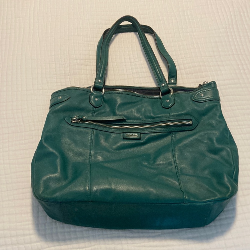 Teal colored leather coach purse